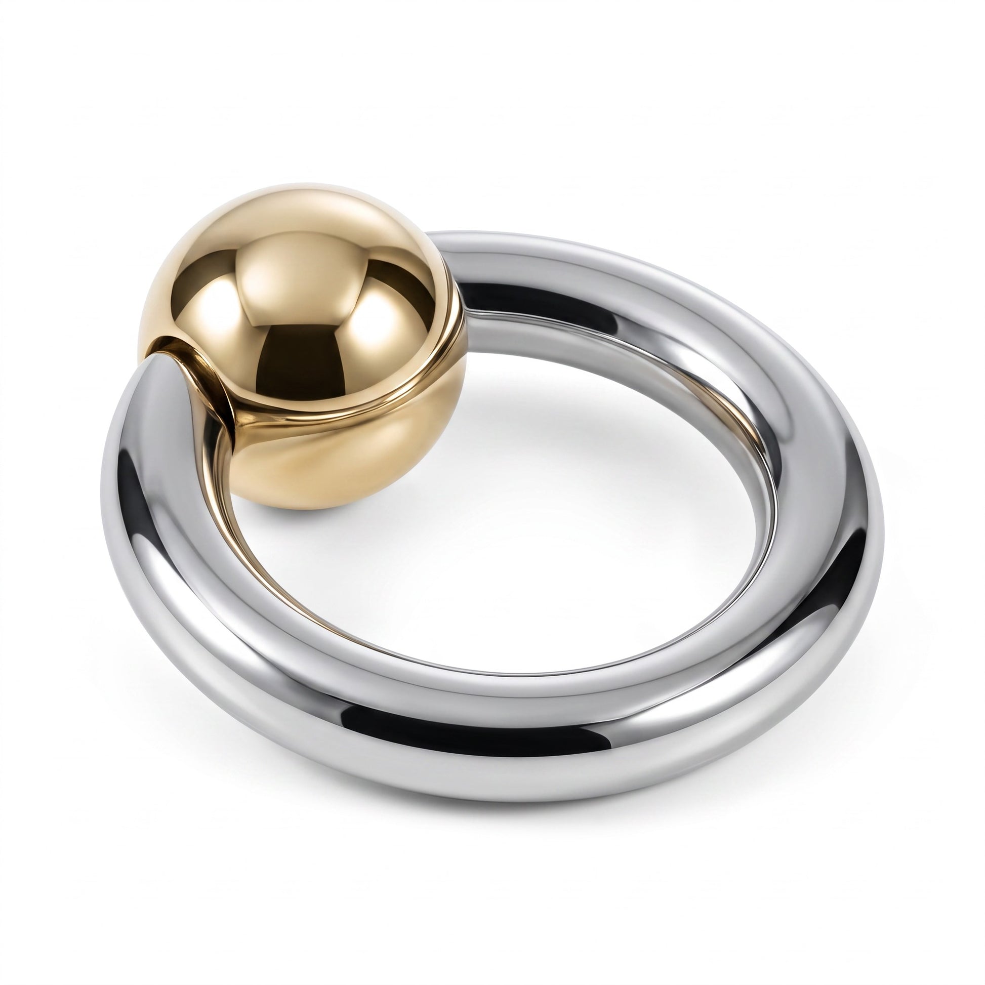 The Glans Ring with Golden Ball is a premium accessory crafted from durable AISI 304 SURGICAL STEEL. Featuring a smooth silver finish with a striking golden ball accent, this ring blends refined style with lasting quality, designed for comfortable and secure wear.