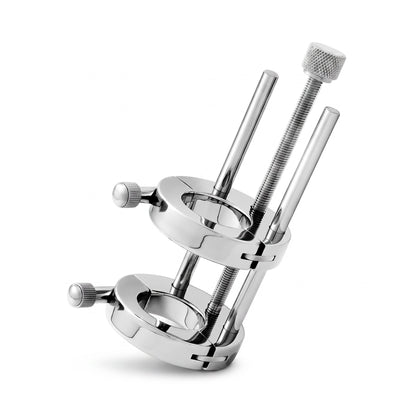 Discover new dimensions of sensuality and connection with the Ultimate Ball Stretcher. Crafted from premium AISI AISI 304 AISI 304 SURGICAL STEEL in a lustrous silver finish, this ball stretching stand offers two inner diameter options: 30 mm and 35 mm. With a unique hinged design and an adjustable threaded rod extending up to 120 mm, it delivers an intense, customizable experience. Weighing approximately 720 grams, it provides a perfect balance of weight and comfort for your most intimate moments.